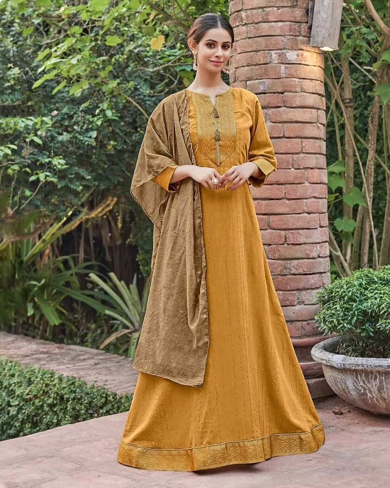 Muslin Majestique Musturd Flaired Length Gown With Dupatta